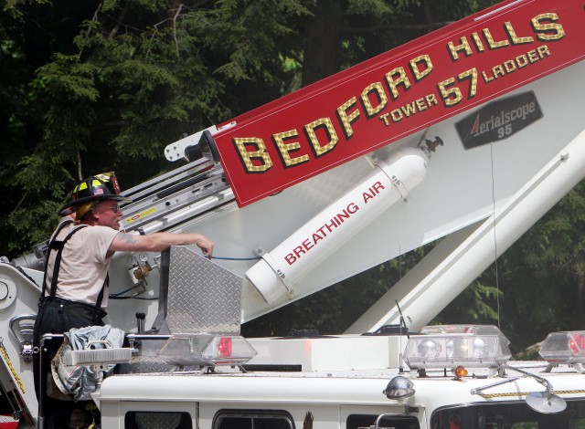 Firefighter Pete Welch @ 77 Chestnut Ridge rd Photo courtesy Frank Becerra